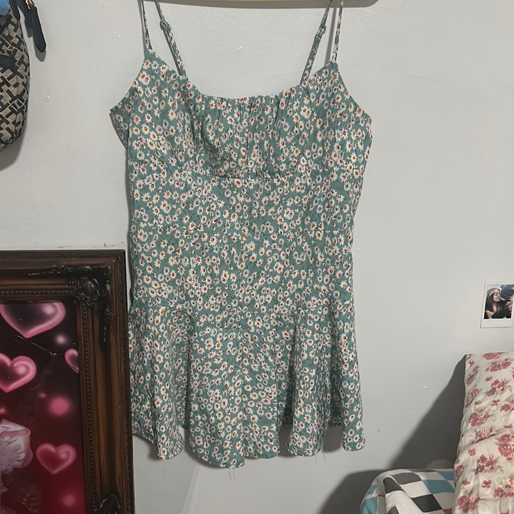 Blue romper with flowers